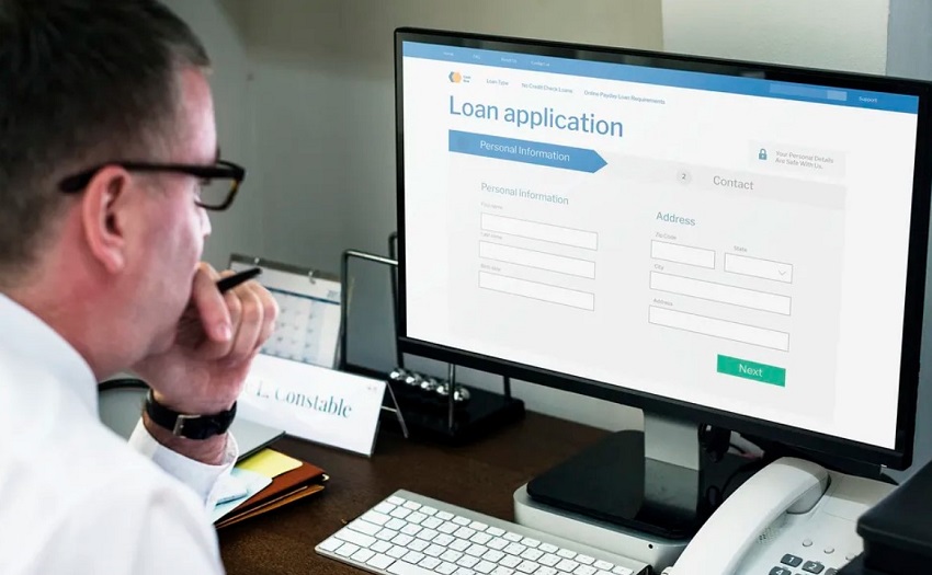 man checking for loan application